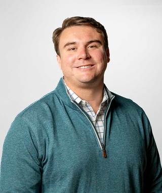 A portrait of Reid Higgins