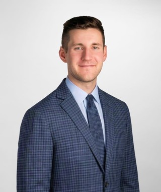 A portrait of Andrew Merrills